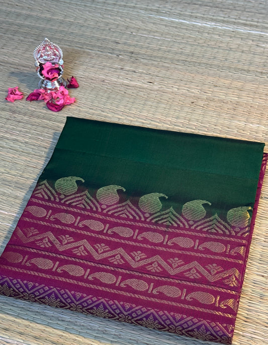 Green and Rani pink, mango patterned handloom pure Molakalmuru silk saree